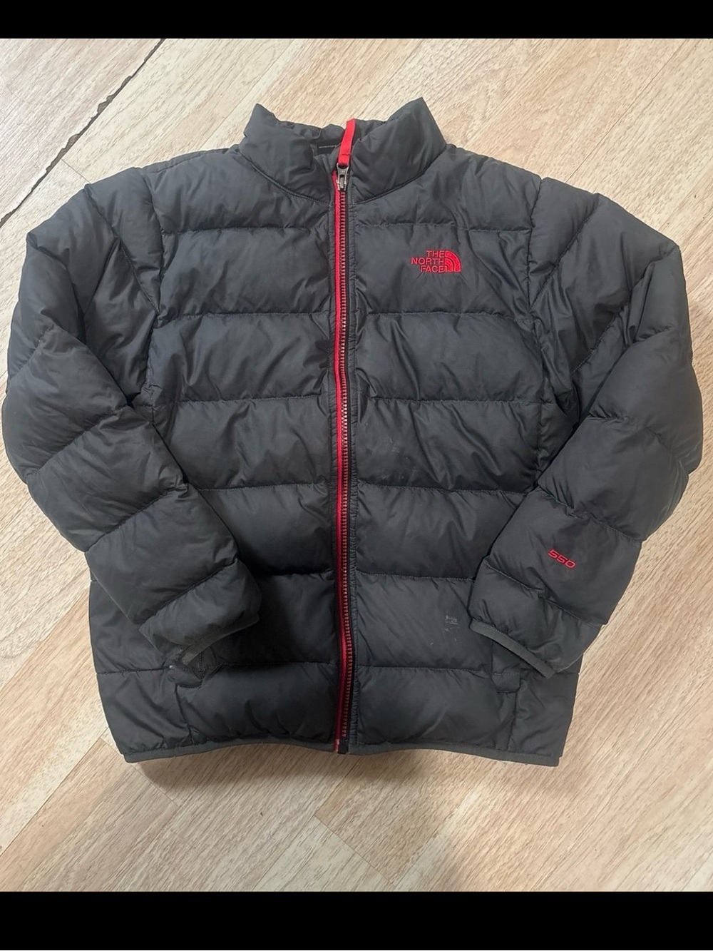 The North Face Kids Black Puffer Jacket with Red Details